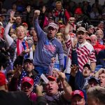 Kremlin Playbook Targets France 2027 Crowd of supporters cheering at an indoor political rally