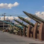 Row of missiles on display outdoors