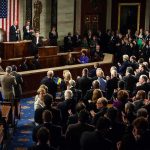 Family War Explodes On Capitol Hill Legislators give a standing ovation in a grand chamber