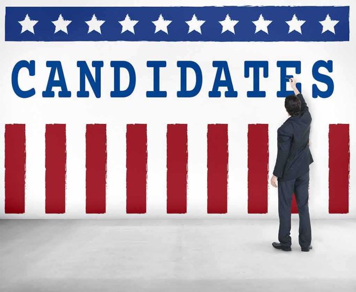 Man in suit writing on wall with word candidates and patriotic design