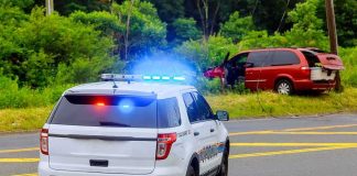 She Was Jailed For 13 Days. Then The Case Fell Apart Police SUV with flashing lights at roadside crash scene