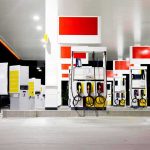 Gas station fuel pumps at night