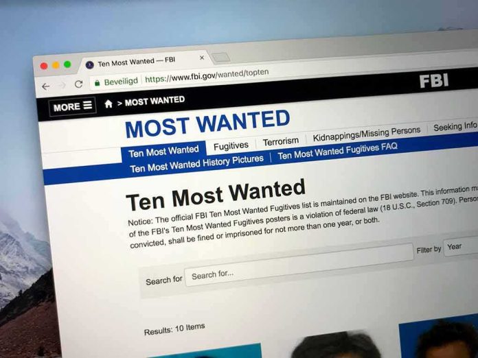 shutterstock_1163296018 Computer screen showing an FBI Most Wanted webpage
