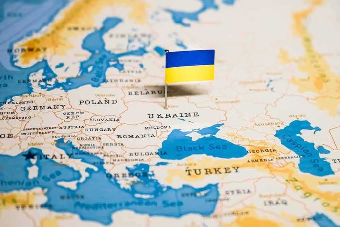 shutterstock_1331092814 Ukraine flag pin on a map of Eastern Europe