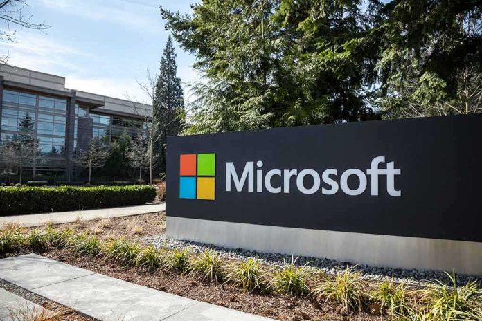 Microsoft sign outside a modern office campus