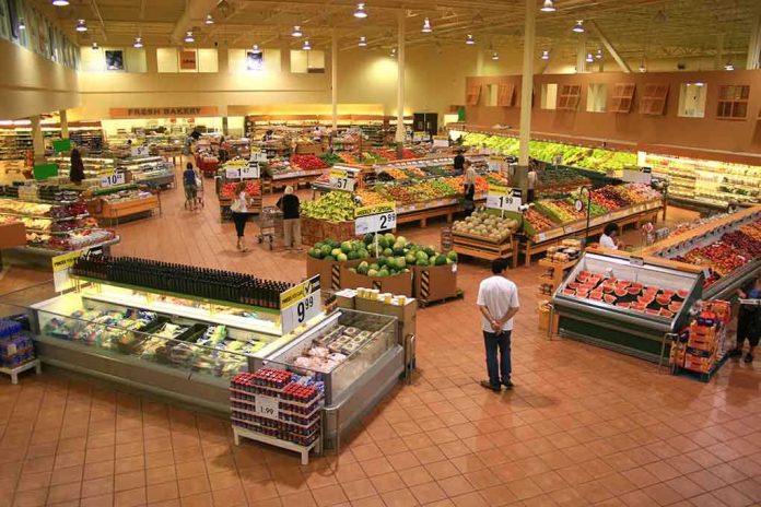shutterstock_15941416 Interior of a grocery store filled with fresh produce and shoppers
