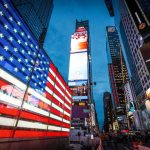 American flag LED display in Times Square at dusk