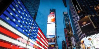 American flag LED display in Times Square at dusk