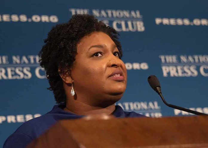 Woman speaking at a podium with microphone