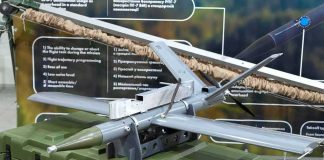 small military drone displayed on a green equipment case