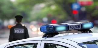 Cop Turns Crime Tool Into Stalker Weapon police car roof with blue emergency lights