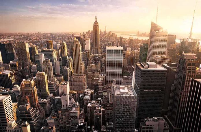 shutterstock_301418195 Skyline of a dense city with tall skyscrapers at sunset