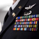 Drone Barrage Hits Hub—Lives Saved, Questions Boil Military dress uniform with medals and ribbons