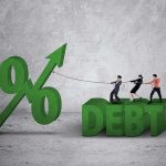 Three people pulling rope tied to rising percent sign beside large debt text