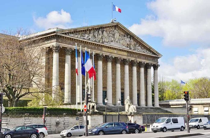 Neoclassical building with columns and French flags