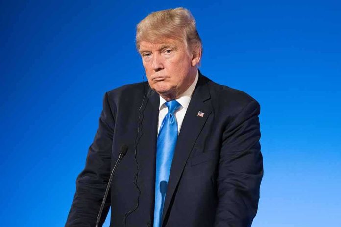 Donald Trump at a podium against a blue background
