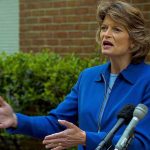 Knife-Edge Vote: One Republican Breaks Lisa Murkowski speaking at an outdoor press conference with microphones in front