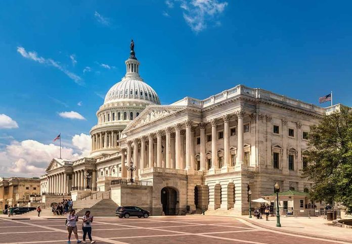 United States Capitol building with dome and columns under a blue sky