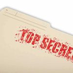 Manila file folder stamped TOP SECRET in red